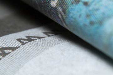Macro shots folded a newspaper closeup picture