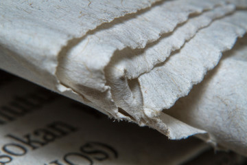 Macro shots folded a newspaper closeup picture