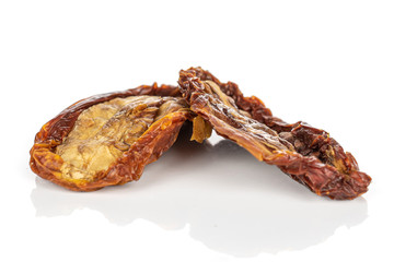 Group of two whole dried red tomato piece isolated on white background