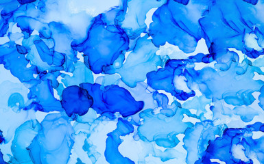 Abstract background of classic blue colors. Painting with alcohol ink. Decorative marble background. Trendy color 2020.Close-up