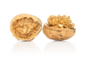 Group of two halves of fresh brown walnut isolated on white background