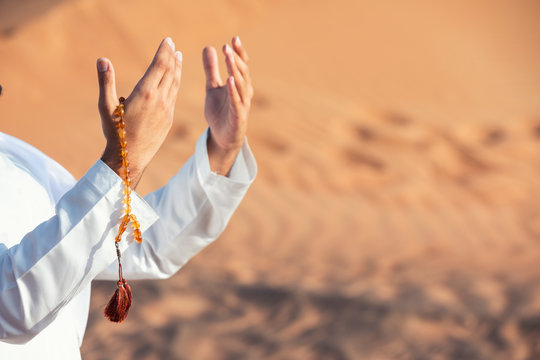 Arab male hands rising to god, Duaa, islamic concept.