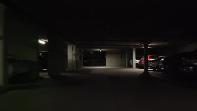 Underground Parking Lot First Person View Backwards Quickly