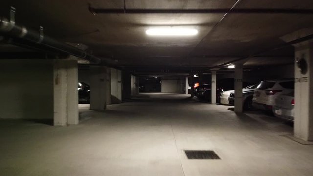 Underground Parking Lot First Person View Backwards