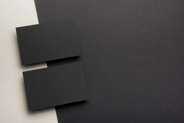 Business card blank on wooden background. Corporate Stationery, Branding Mock-up. Creative designer desk. Flat lay. Copy space for text