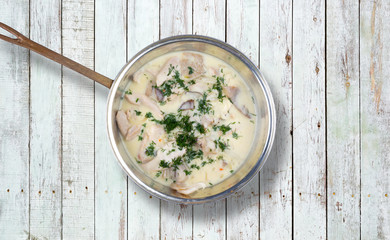 Turkey breast with white sauce and herbs baked.