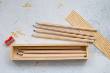 wooden pencil case with colour pencils for back to school