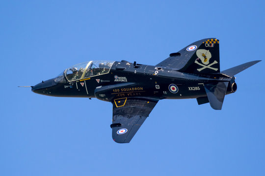 FLORENNES, BELGIUM - JUN 15, 2017: Royal Air Force BAe Hawk T1 trainer jet flying by over Florennes Airbase.