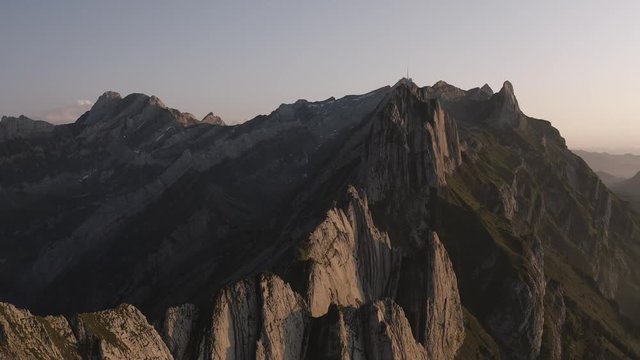 Dramatic scenery. Aerial view of the mountains during colorful sunset. 