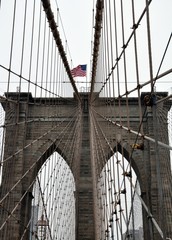 Brooklyn Bridge, New York City, nobody with USA flag