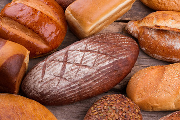 Assortment of artisan bread close up. Variety of fresh healthy bread close up.