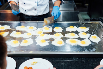 eggs in the kitchen of the restaurant scrambled egg yolk protein