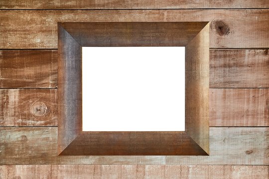 Empty blank picture frame or window on a wooden lumber wall of a cabin