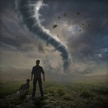 Tornado approaches man and his dog