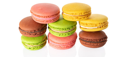 French macarooons in a raw, isolated on white background