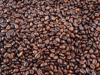 Roasted coffee beans, background. horizontal orientation. Fresh aromatic dark coffee.