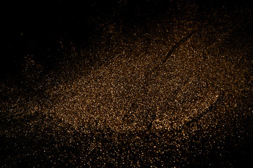 Gold defocused glitter background with copy space