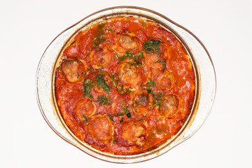 National American Cuisine Tuna cutlets in tomato sauce. Top view. Flat lay with copy space.