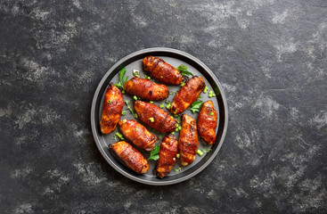 Bacon wrapped grilled chicken wings