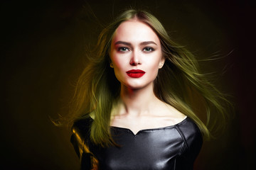 Fototapeta premium Woman with healthy Hair in color Light