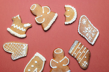 Christmas background. Handmade festive gingerbread cookies. Copy space for text. Winter holidays background mock up