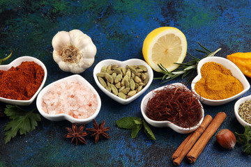 Spices and herbs on table. Food and cuisine ingredients with oil and vinegar