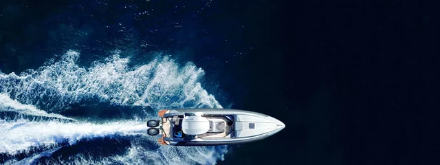Foto op Canvas Luchtfoto drone ultra brede top-down foto van luxe stijve opblaasbare speedboot cruisen in hoge snelheid in de Egeïsche diepblauwe zee, Griekenland © aerial-drone