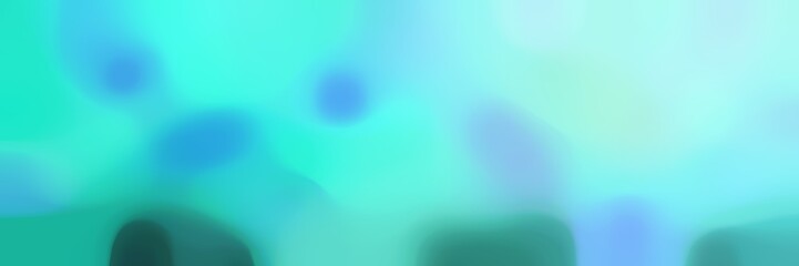 blurred horizontal background with turquoise, pale turquoise and sea green colors and space for text or image