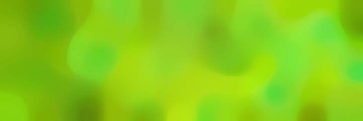 blurred bokeh horizontal background texture with yellow green, dark green and moderate green colors and free text space