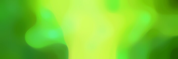 blurred bokeh iridescent horizontal background with green yellow, dark green and yellow green colors space for text or image