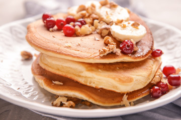 Plate with tasty sweet pancakes, closeup