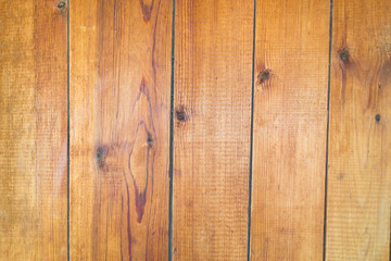 Old brown wooden background with vertical boards.