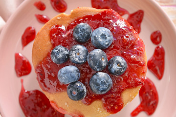 Plate with tasty sweet pancakes, closeup