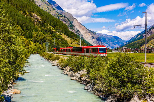 train in the mountains of switzerland