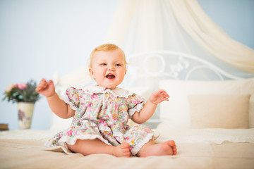 Fototapeta premium Portrait of a cheerful pretty fair-haired girl