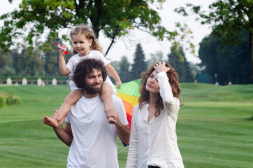 Happy young family in the park