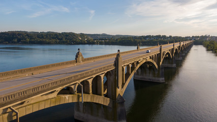 Arched bridge across river, classic architecture, aerial view