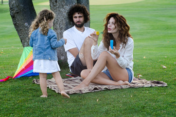 Happy young family in the park