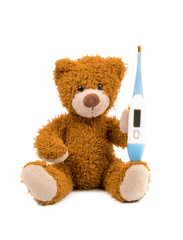 .teddy bear with a thermometer on a white background