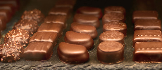 Homemade chocolates to give at Christmas or Valentine's Day. Chocolate sweets in traditional market.
