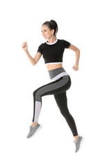 Sporty running young woman against white background