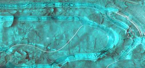 Ice pattern. View from above on the surface of the water after autumn freezing.