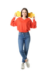 Stylish hipster girl with skateboard on white background