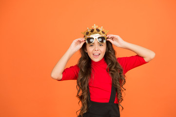 Love myself. Egoist child. Little girl wear prop crown and glasses. Small egoist with ambition....