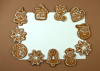 Christmas Ginger and Honey cookies on white surface. Star, fir tree, snowflake shape.