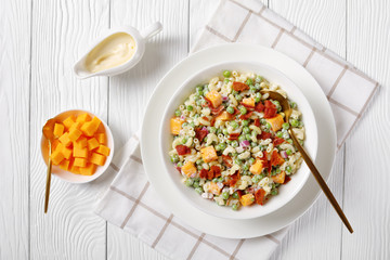 pasta salad with green peas, fried bacon