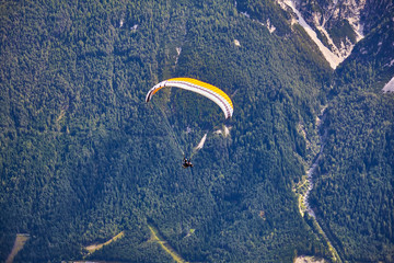 Paragliding in the mountains, in the Stubai Valley, Tyrol, Austria.