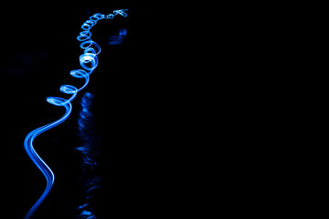 Abstract light painting by led lantern in the dark