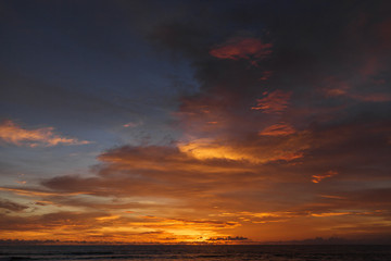 Beautiful sunset on the ocean. Color of the sky