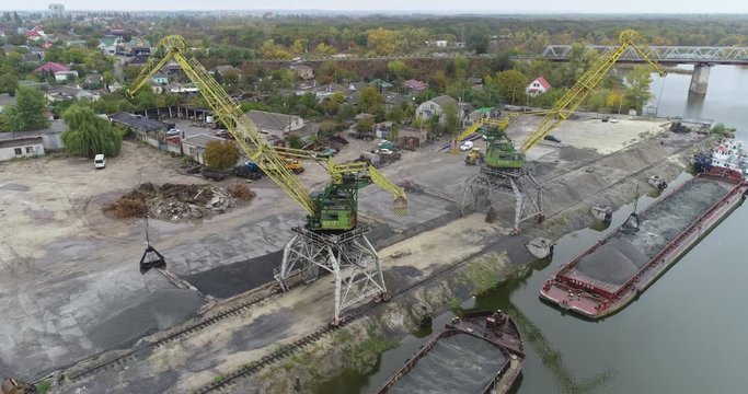 River port with cranes, view of the river port with large cranes during operation